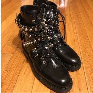 Black studded boots.